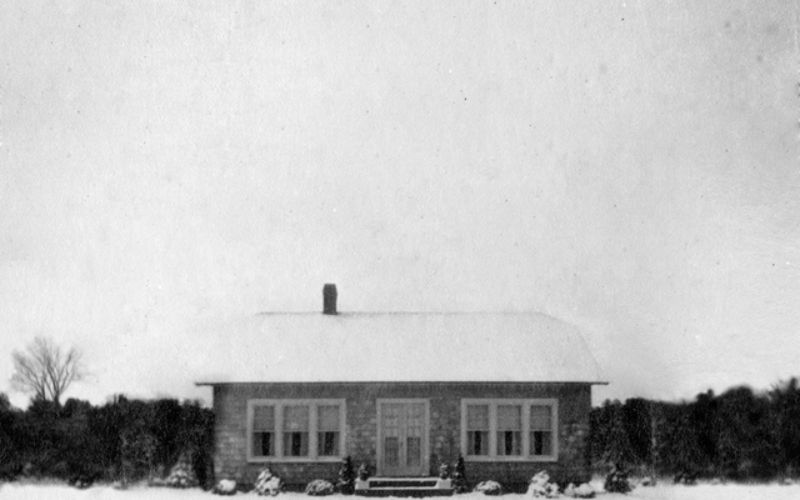 B&W Effect image of a house covered with snow