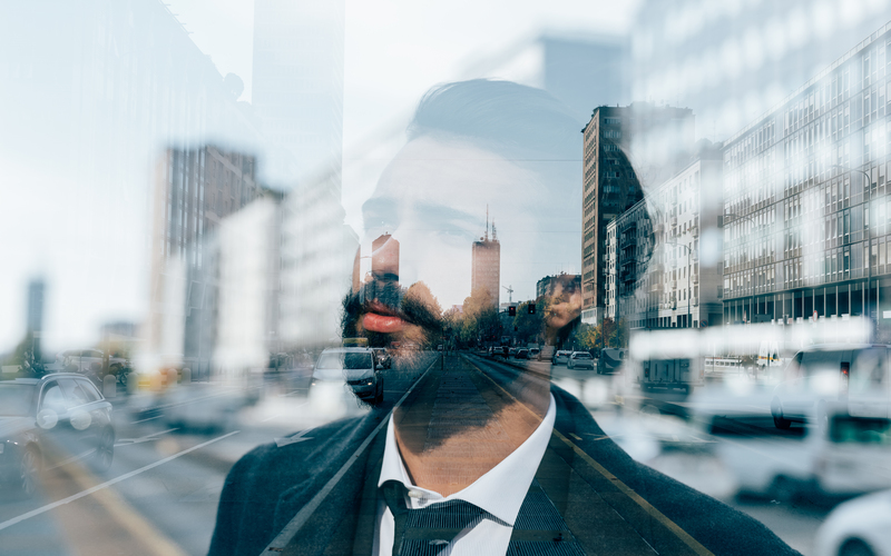 Double exposure of young business bearded man outdoor