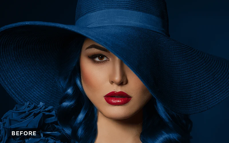glamorous model posing in a blue hat