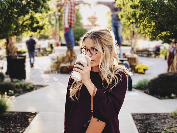 Girl Holding A Coffee Cup Hand Pose