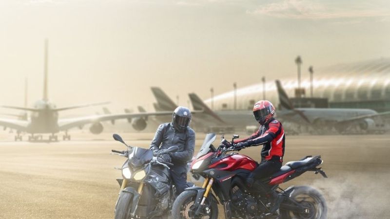 composited image with both bikers placed on the flight runway without grading
