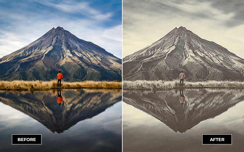 man wearing orange and black at the foot of a mountain with reflection on the river