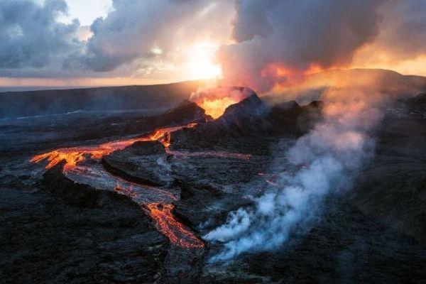 active volcano landscape with hot lava flowing out