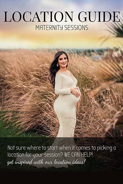 A pregnant woman posing in white dress