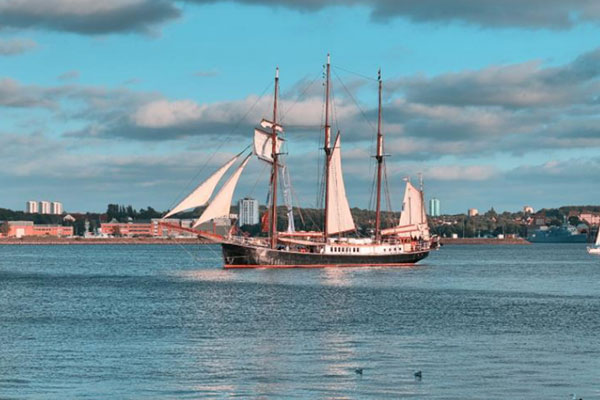 An image of a sail ship in the sea