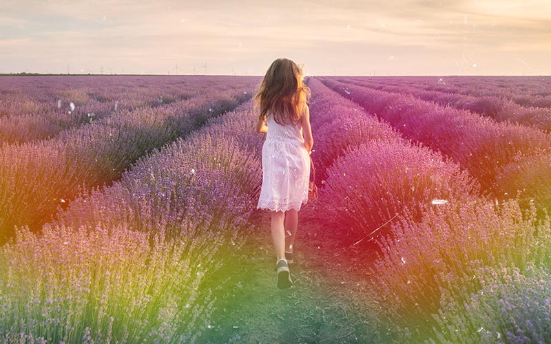 Girl running in lavender field