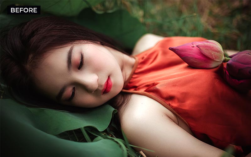 Woman sleeping on a grass