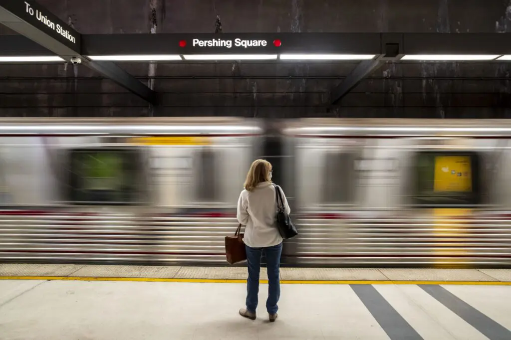 motion blur image of a lady in a subway