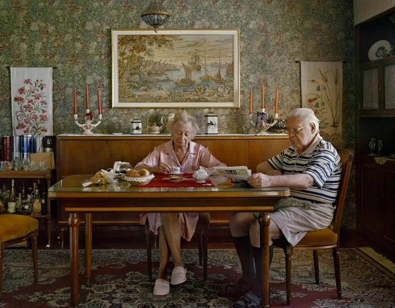 old couple sitting on a normal day