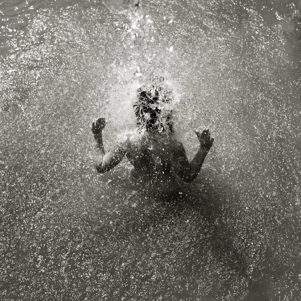 Picture of a boy in splashing water