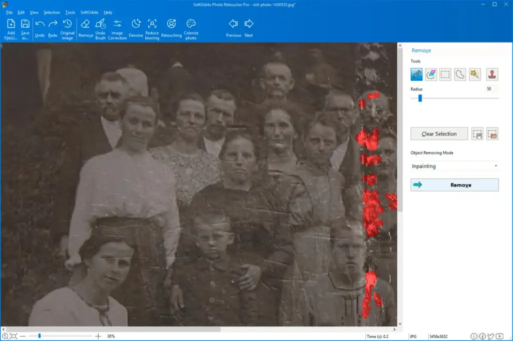 Reduce spots with old photo restoration software