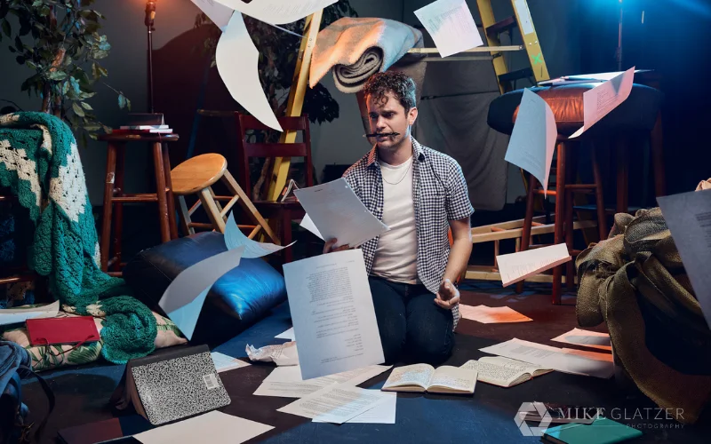 creative image of man holding papers