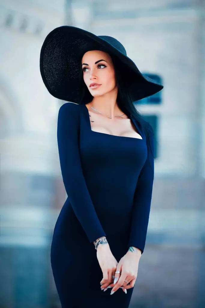 glamorous model wearing a big black hat