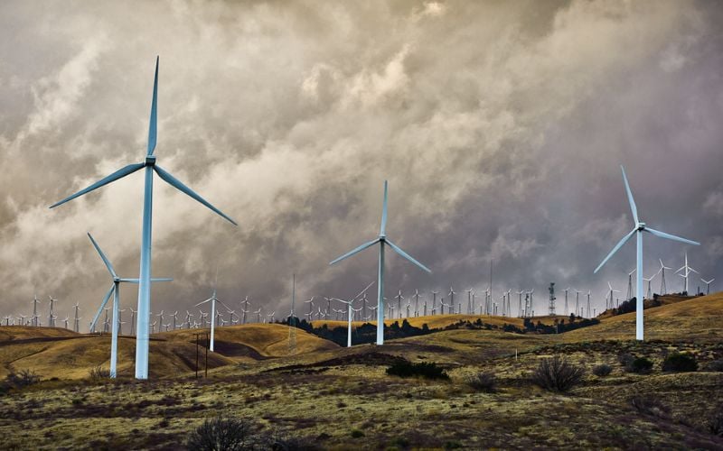 image of windmills on hills