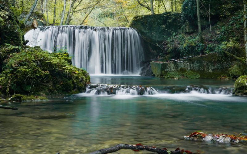 Amazing long exposure image of waterfall, cascade in forest.