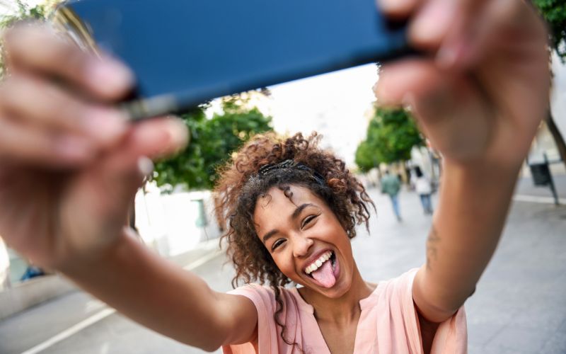 Carefree woman capturing a selfie