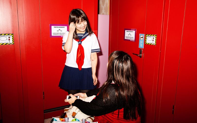Two girls image with red background