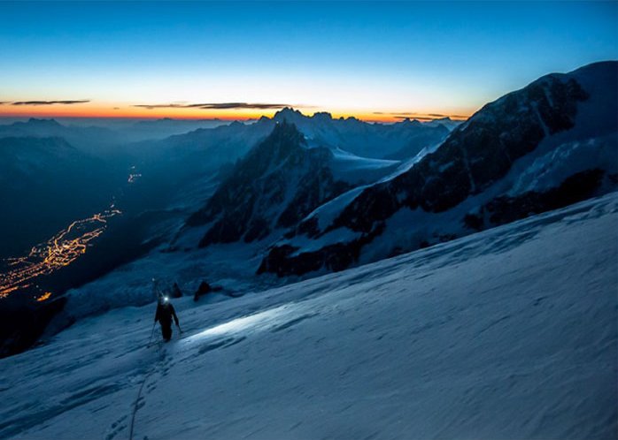 An image of a mountaineer in snowy mountains