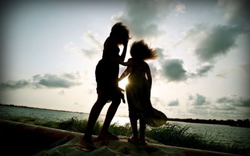 Image of two girls in the open sky