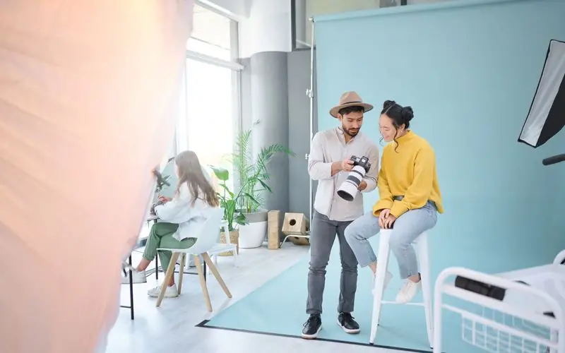image of a photographer and model