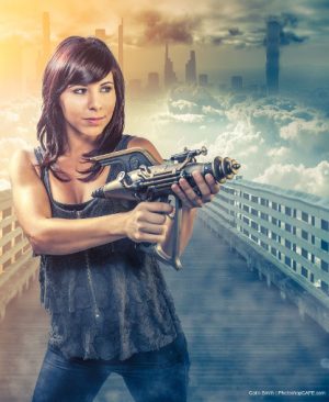 image of a lady holding a gun
