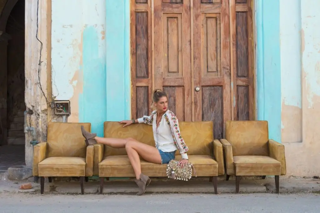 girl sitting on a vintage sofa