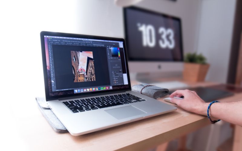 An image of a person using laptop