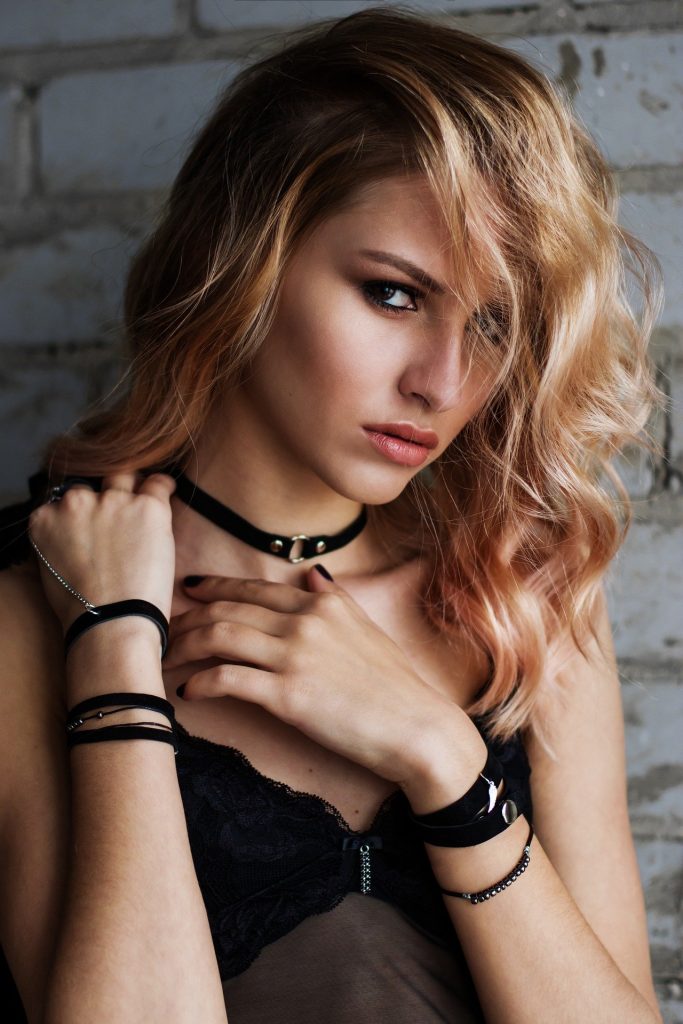 Woman bold posing in black