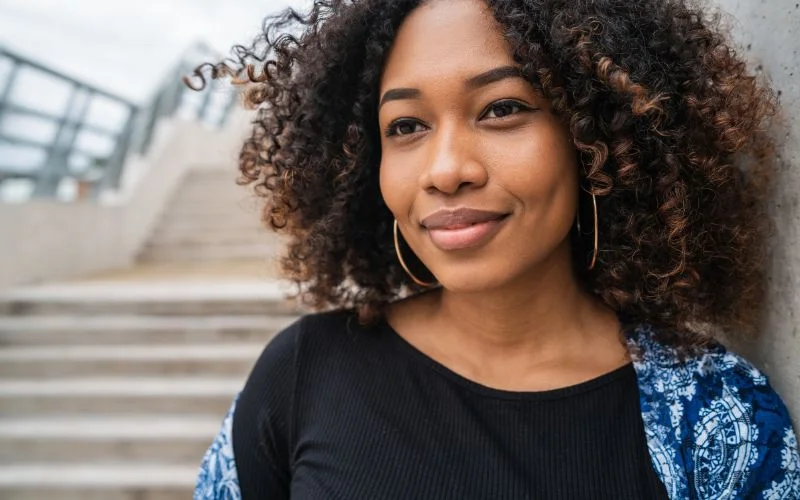 smiling chin raised female poses