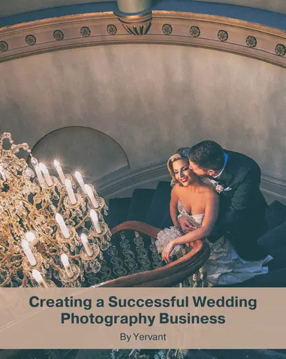 A beautiful wedding couple posing on staircase for a wedding photoshoot