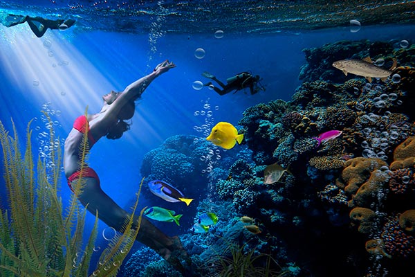 Girl diving underwater