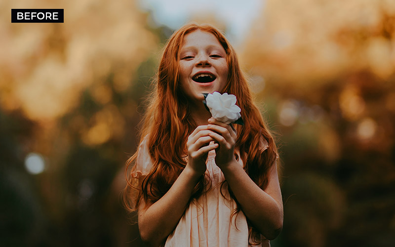 Girl holding a flower