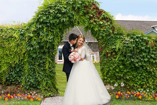 A newly wed couple posing
