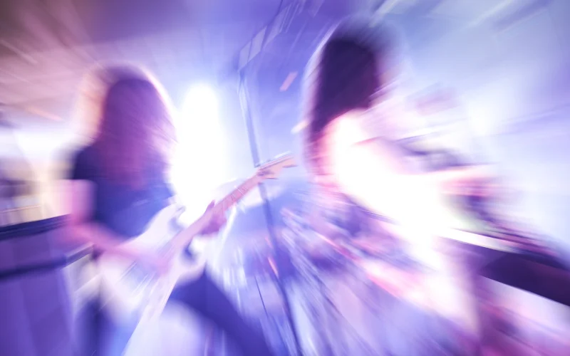 guitarist at a concert motion blur photography