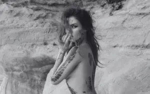 black and white photo of a nude women