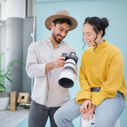 creative-photographer-and-model-choosing-a-pictur-2023-02-14-22-50-55-utc-1-1