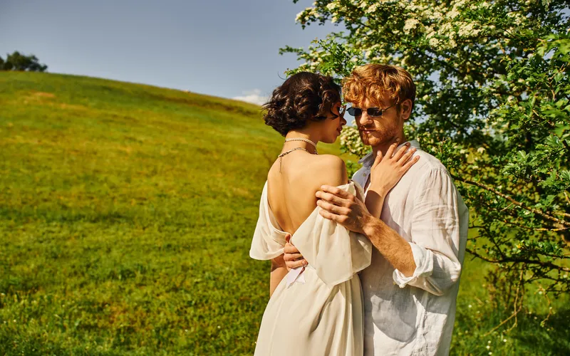 Couple hugging each other in nature