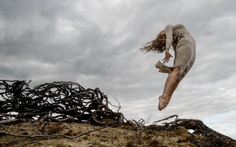 Two models posing together to show balance in abstract figure photography
