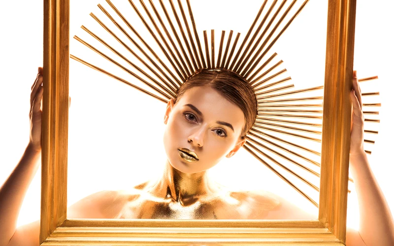 Model framed within a tub for a minimalist abstract figure photography pose