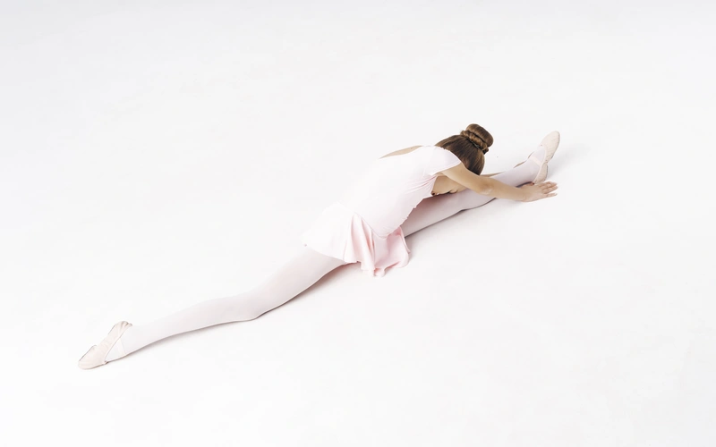 Model standing with strong posture for a striking abstract figure photography pose.