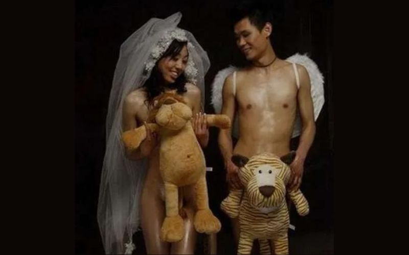 nude wedding-cute pose with toys
