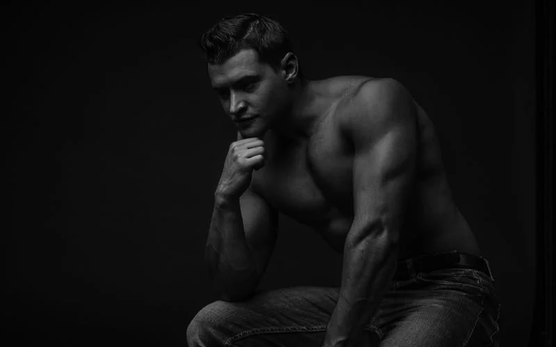 leaning forward male nude pose