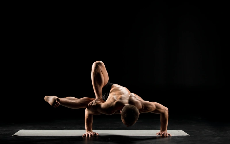 Man doing yoga poses