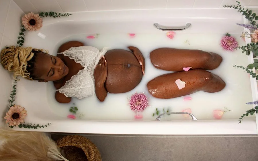 posing in a milk bath tub