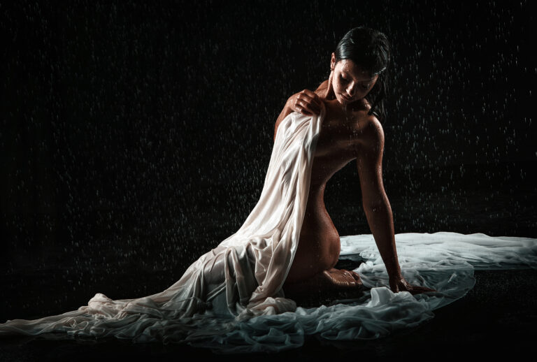 Nude Model doing artistic nude pose