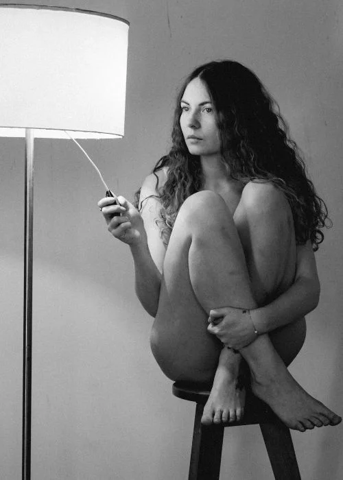 black and white image of a nude woman