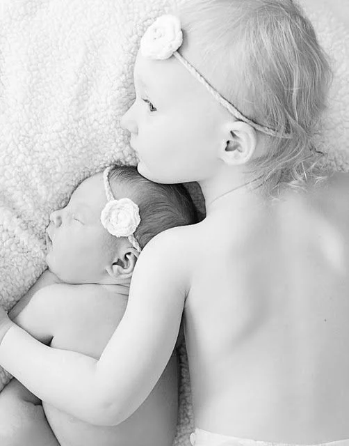 Cute siblings on the bed