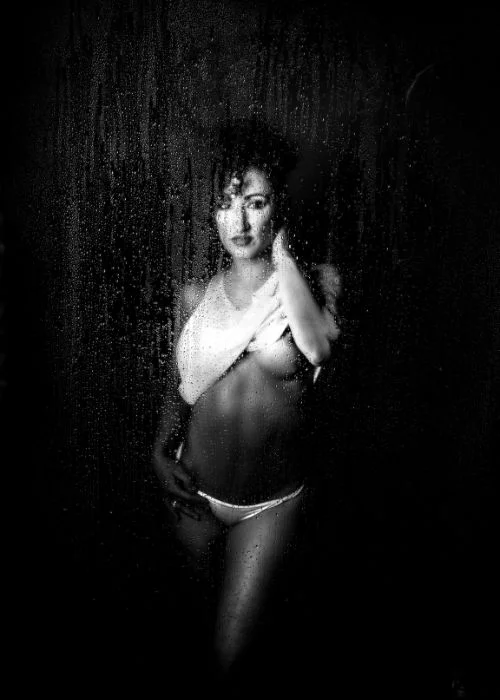 black and white image of a nude lady