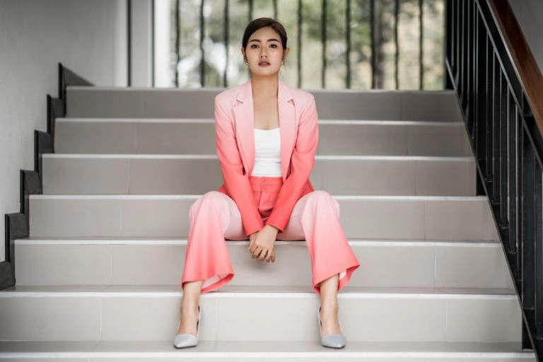 woman sitting on stairs pose