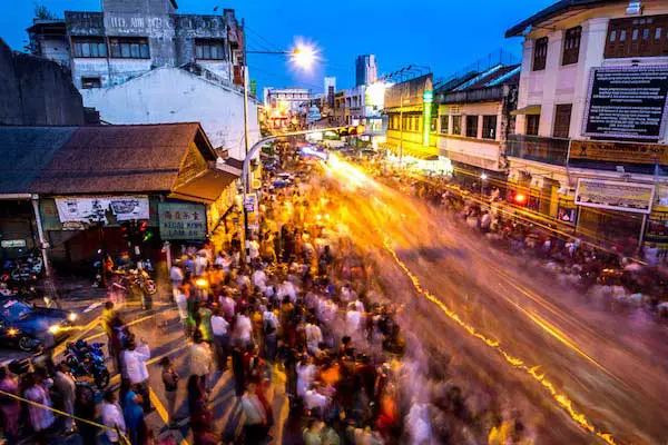 image showing a busy city at night